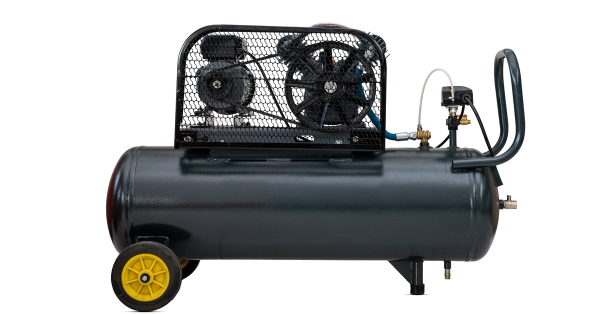 A portable horizontal air compressor with a black storage tank, belt-driven motor, protective guard, and yellow wheels. A portable horizontal air compressor with a black storage tank, belt-driven motor, protective guard, and yellow wheels.